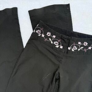 vintage fitted low rise trousers with embroidered detailing on the belt